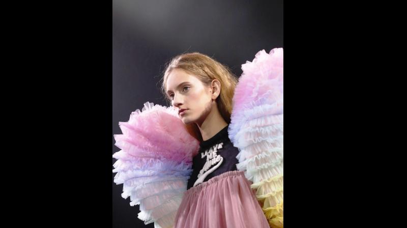 : Slogan Gowns, skirts and t-shirts with intricate patterns ruled the ramp walk at Paris Haute Couture Week. (Photo: AP)
