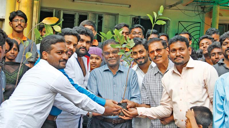 Bhagwan Singh, Executive editor of Deccan Chronicle, Justice P. Jyothimani and actor Aari take part in the tree planting drive, during which 5,000 saplings were  planted in the city. (Photo: DC)