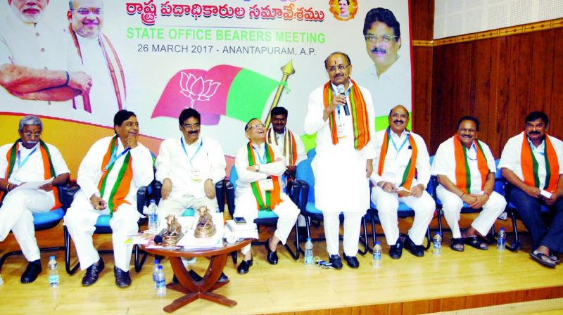BJP state in-charge and UP minister Siddarthnath Singh addresses a BJP leaders meeting in Anantapur on Sunday. (Photo: DC)