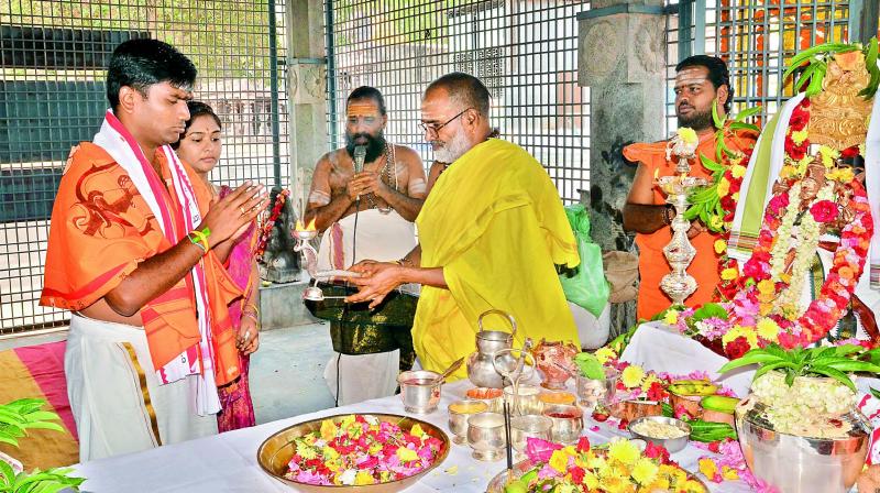 The five-day Ugadi Mahotsavams kicked off at the Srisailam Temple of Kurnool district on Sunday with temple priests performing pooja. (Photo: DC)