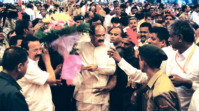 Vice President-elect M. Venkaiah Naidu arrives at a felicitation function in Bengaluru on Sunday. (Photo: DC)