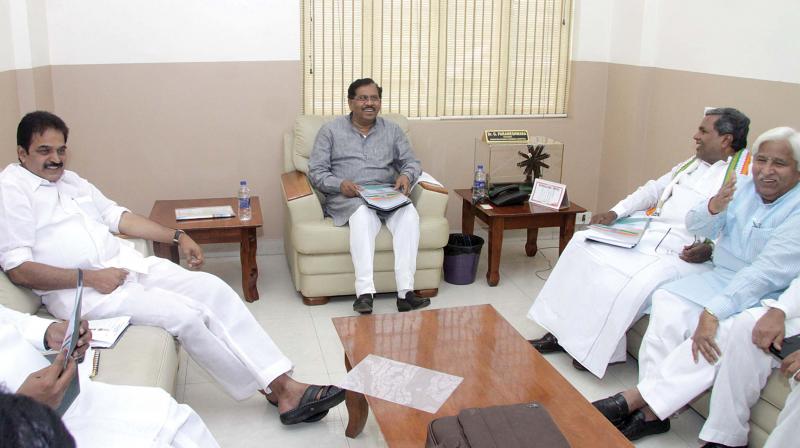 AICC general secretary and in-charge of party affairs in Karnataka K.C. Venugopal, KPCC president Dr G. Parameshwar, CM Siddaramaiah and RDPR minister H.K. Patil at partys Chintan Mantan in Bengaluru on Monday. (Photo: DC)