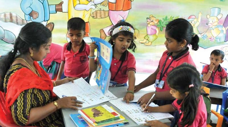 Students at Jinarajdas LP School, Naduvattam, Marad, Kozhikode. (Photo: DC)