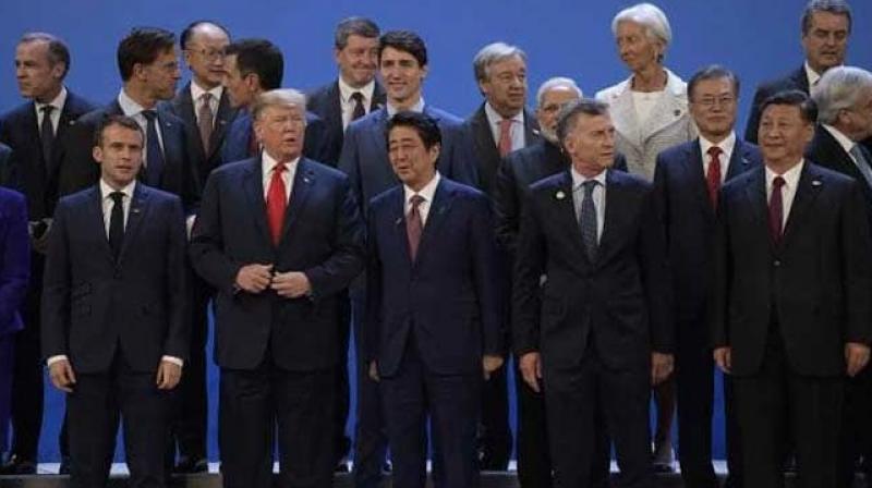 The first day of the G20 summit offered glimmers of hope for progress between Washington and Beijing despite Trumps earlier threat of new tariffs, which would increase tensions already weighing on global financial markets.(Photo: AFP)