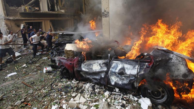 The officials say Thursdays blast on the outskirts of the border town of Arsal burned a small truck that the five people were using. (Photo: AP)