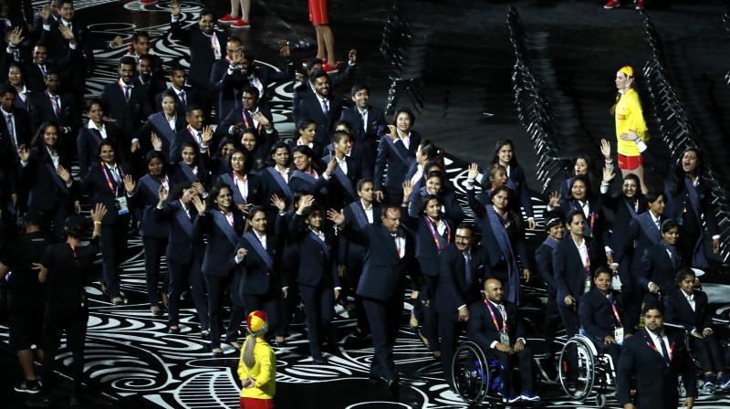 Indias flag-bearer PV Sindhu leads a confident and strong Indian contingent during the opening ceremony of the Commonwealth Games in Gold Coast on Wednesday.(Photo: AP)