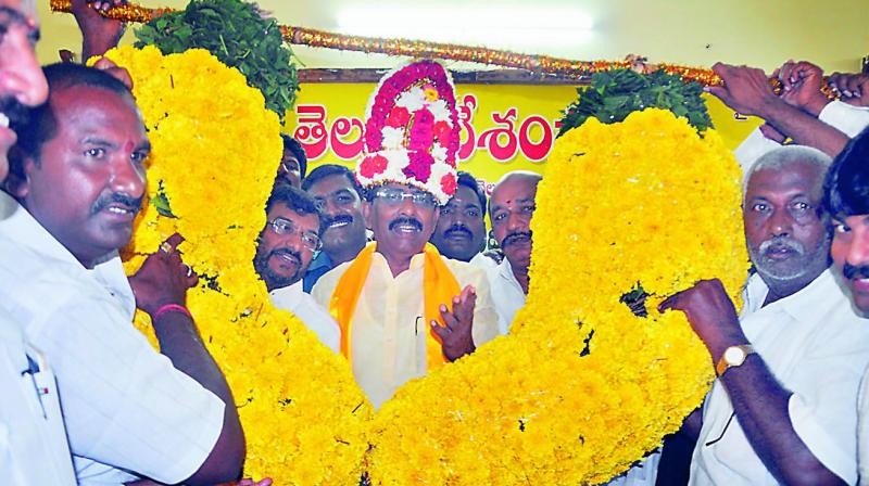 TD activists felicitate Vakati Narayana Reddy, who won MLC local bodies seat in Nellore with a margin of 87 votes on Monday. (Photo: DC)