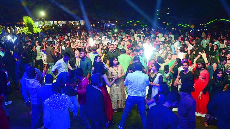 Vizagites revel in a New Year party at a hotel in Visakhapatnam.