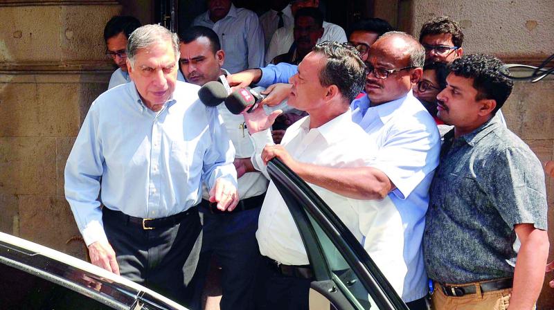 Tata groups interim chairman Ratan Tata leaves Bombay House after meeting with Board members in Mumbai on Tuesday. (Photo: DC)