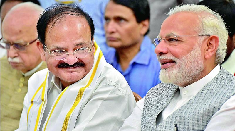 NDA vice-presidential candidate Venkaiah Naidu with Prime Minister Narendra Modi, and BJP senior leader L.K. Advani after filing his nomination papers at Parliament in New Delhi on Tuesday. (Photo: PTI)