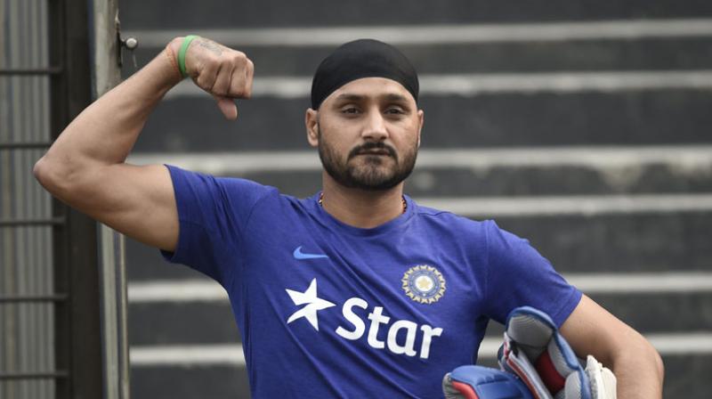 Harbhajan Singh gave a fitting reply to fan who asked him to wear a turban properly. (Photo: AFP)