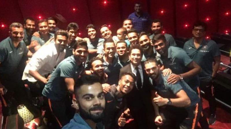 Virat Kohli clicks a selfie with Sachin Tendulkar Team Indias Champions Trophy squad, at the Sachin: A billion dreams premier. (Photo: Twitter/ Sachin Tendulkar)