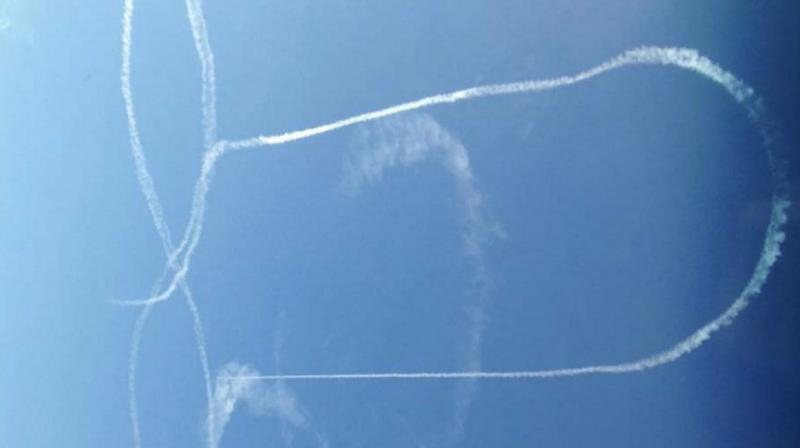 The pilot painted an enormous outline of a penis in the sky using the condensation trails from his multi-million-dollar warplane. (Photo: Twitter/DaffyDano)
