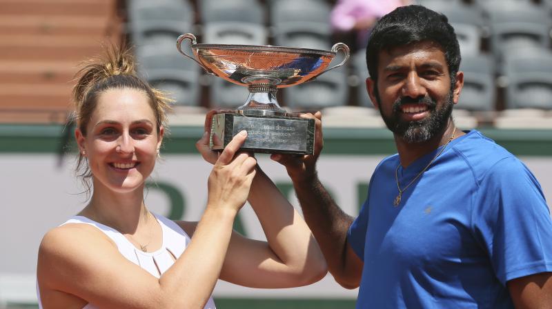 Rohan Bopanna and Gabriela Dabrowskibeat beat Colombias Robert Farah and Germanys Anna-Lena Groenefeld 2-6, 6-2, 12-10 to win the French Open mixed doubles title. (Photo: AP)