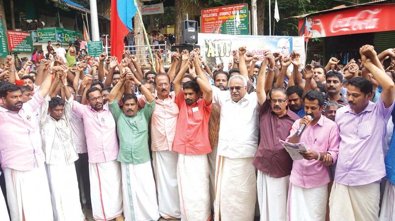 CPI state secretary Kanam Rajendran joins the human chain formed by AIYF on Sunday.