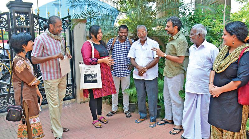 Carnatic Vocalist T.M. Krishna explains a point to vizha organisers on Thursday. Also seen in the picture are rapper Sofia Ashraf (extreme left), social activist Nithyanand Jayaraman (second from left) and village heads R. Srinivasan and R. Sundaramurthy. (Photo: DC)