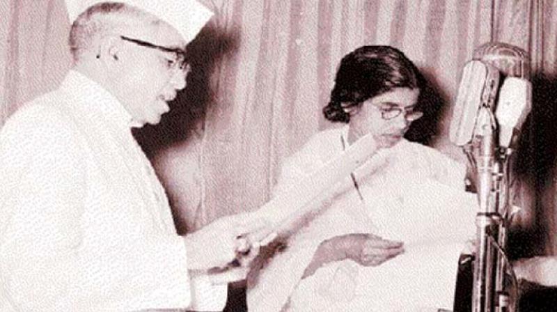 Governor Ramakrishna Rao administers the oath to  K. R. Gowriamma in 1957. She was Minister for Revenue and Excise.
