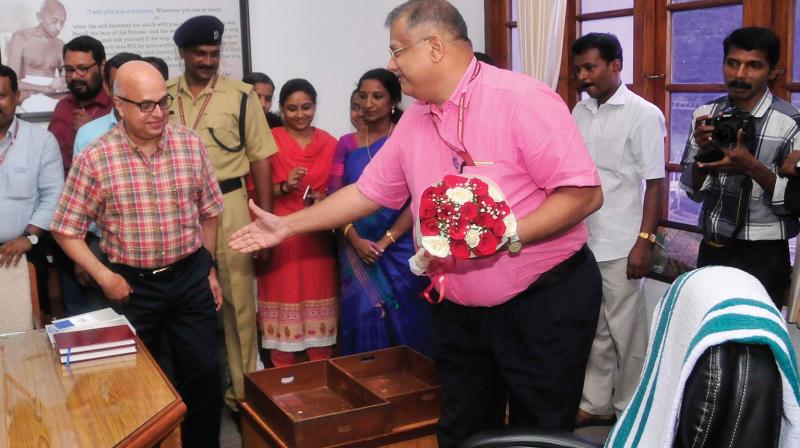 Outgoing Chief Secretary Paul Antony makes way for his successor Tom Jose at the Secretariat in Thiruvananthapuram on Saturday. (Photo: A.V. MUZAFAR)