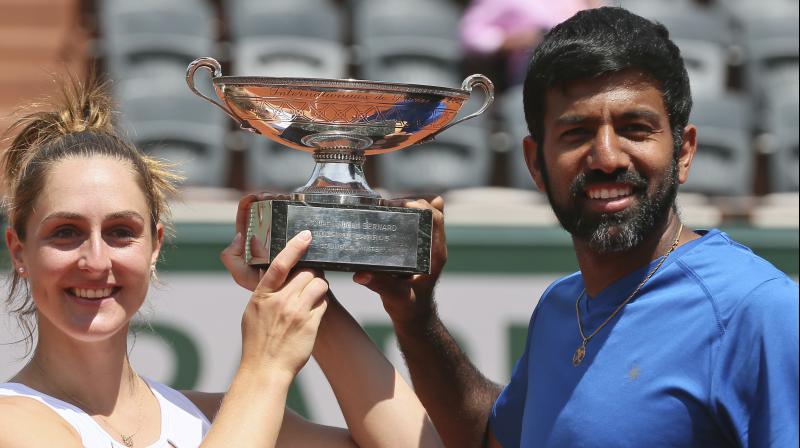 Rohan Bopanna won his first ever Major title with Gabriela Dabrowski, who became the first Canadian woman to win a Grand Slam trophy.(Photo: AP)