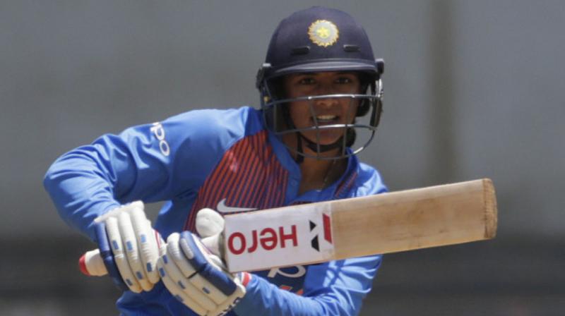 Smriti Mandhana and Harmanpreet Kaur starred with the bat as the Indians racked up 167-8 batting first, before restricting Australia to 119-9. (Photo: AP)