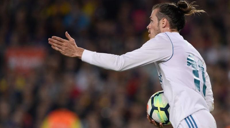 This was the first Clasico in a decade which had no bearing on the title race but the game was still played with all the usual passion and tension which makes it the most famous club fixture in Europe. (Photo: AFP)