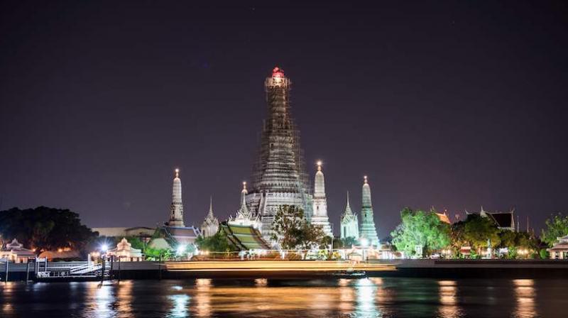 The riverside temple, whose ancient prang - tower - is the one of Bangkoks best known landmarks, features on the logo of the Tourism Authority of Thailand. (Photo: AFP)