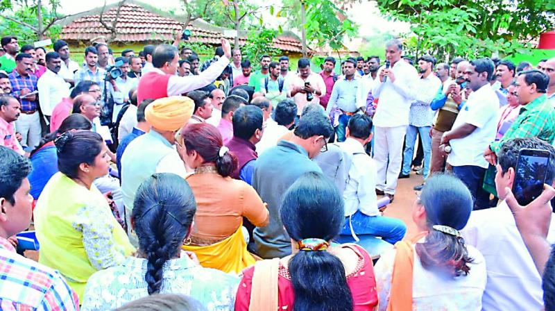 TRS leader T. Harish Rao addresses around 60 MLAs and MLCs from 15 states and 25 IAS officers who visited Ibrahimpur village on Thursday (Photo: DC)