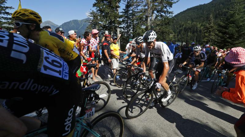Team Sky leader Froome, a four-time champion, finished the stage in eighth place at 1min 35sec behind Colombian winner Nairo Quintana and 48secs behind teammate and overall leader Geraint Thomas. (Photo: AP)