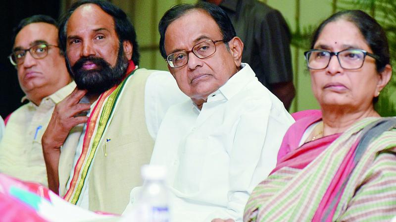 Delhi Pradesh Congress Committee president Ajay Maken (from left), Telangana Pradesh Congress Committee president Uttam Kumar Reddy, former Union finance minister P. Chidambaram and former chairperson, National Commission for the Protection of Child Rights Shanta Sinha, at a seminar on Smt. Indira Gandhis battle against impoverishment of India, in Hyderabad on Saturday. (Photo: S. Surender Reddy)