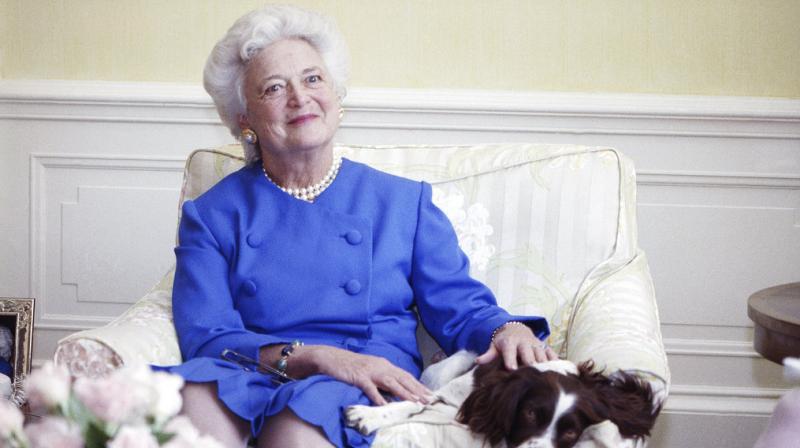 In this 1990 file photo, first lady Barbara Bush poses with her dog Millie in Washington. A family spokesman said Tuesday, April 17, 2018, that former first lady Barbara Bush has died at the age of 92. (Photo: AP)