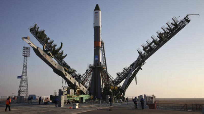 In this photo dated Tuesday, Nov, 29, 2016 the Soyuz-FG rocket booster with the Progress MS-04 cargo ship is installed on a launch pad in Baikonur, Kazakhstan. The unmanned Russian cargo space ship Progress MS-04 broke up in the atmosphere over Siberia on Thursday Dec. 1, 2016, just minutes after the launch en route to the International Space Station due to an unspecified malfunction, the Russian space agency said.(Oleg Urusov/ Roscosmos Space Agency Press Service photo via AP)