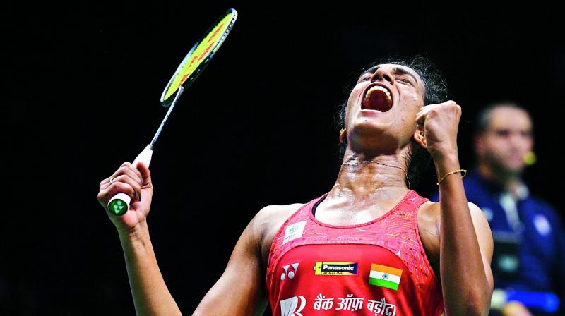 P. V. Sindhu celebrates her victory over Nozomi Okuhara in the womens singles quarterfinals.