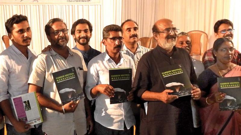 Finance minister Dr Thomas Isaac releases the assessment and recommendations of Carbon Neutral Meenangadi project in Wayanad district at a function held at Meenangadi