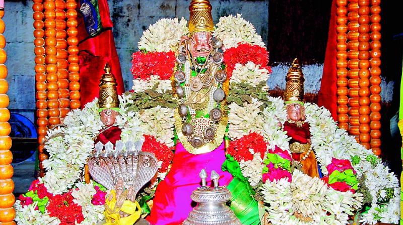 Jwala Narasimha Swamy with his consorts at Upper Ahobilam Temple.