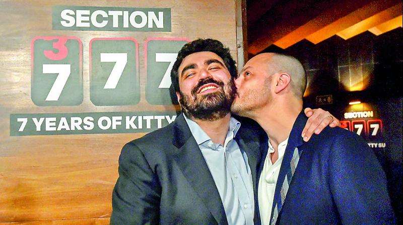 Hotelier Keshav Suri (left), one of the petitioners in the Section 377 case, celebrates the Supreme Court verdict in New Delhi on Thursday.(Photo:  PTI)