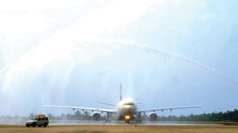 The Jeddah-Kozhikode Saudi Airlines flight gets a customary water salute on Wednesday.
