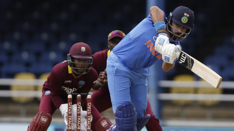Yuvraj Singh plays a shot against West Indies during the first ODI cricket match at Queens Park Oval in Port of Spain. (Photo:AP)