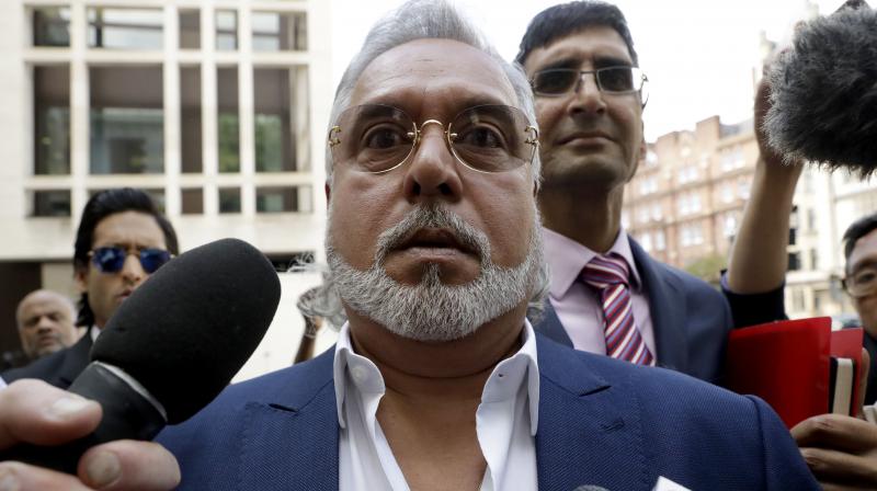 Banks are seeking to recover about $1.4 billion that the Indian authorities say Kingfisher owes. Vijay Mallya has repeatedly dismissed the charges against him. (Photo: AP)