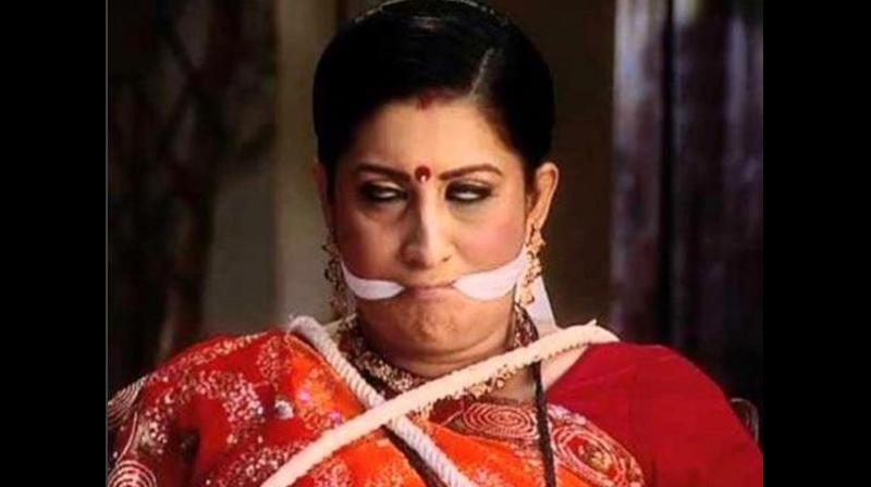 The still shows Smriti Irani gagged and tied up to a chair, and she captioned the image hum bolega to bologe ki bolta hai... (If I speak then you will say that I am blabbing). (Photo: Instagram | smritiiraniofficial)