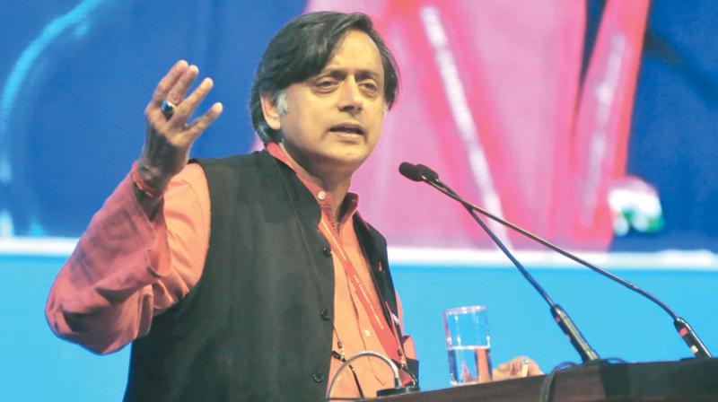 Senior Congress leader Shashi Tharoor speaks during the Dr B. R. Ambedkar International Conference in Bengaluru on Sunday. (Photo: DC)