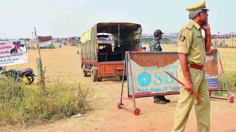 A police picket has been arranged near cockfight dens at Edupugallu where policemen keep a watch to prevent any untoward incidents from occuring near Vijayawada on Saturday. (Photo: DC)