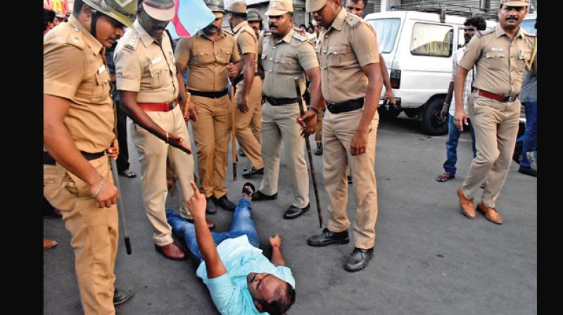 A protester argues with the police during the flash strike by fringe elements in Chennai on Tuesday demanding scrapping of the IPL matches. (Photo: DC)