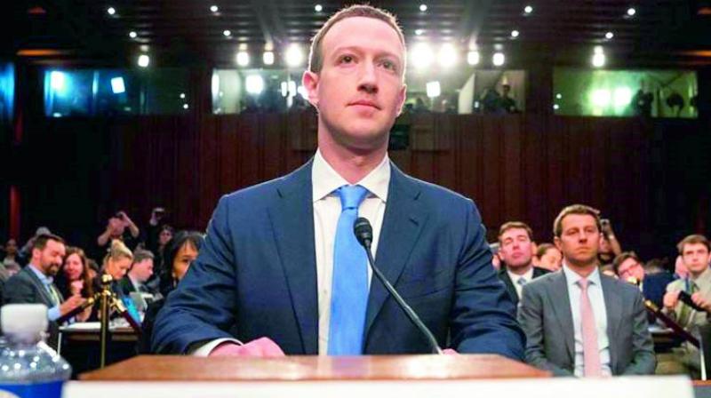 Facebook founder Mark Zuckerberg giving his testimony to members of the US Congress.