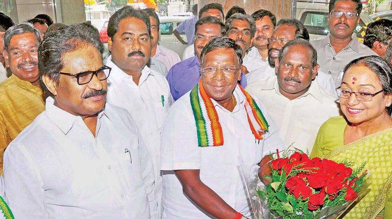 Oppositions presidential nominee Meira Kumar received by Puducherry CM V. Narayanasamy on her arrival in Puducherry on Sunday to meet the ruling Congress and DMK legislators to seek their support for her candidature.