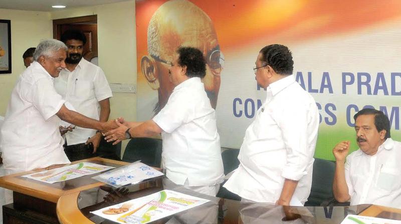 Congress MP and returning officer of organisational elections, E.M. Sudarshana Natchiappan being greeted by former Chief Minister Oommen Chandy at Indira Bhavan in Thiruvananthapuram on Tuesday coinciding with the high power Political Affairs Committee meeting. Also seen are KPCC president M. M. Hassan and Opposition Leader Ramesh Chennithala. (Photo: A.V.MUZAFAR)