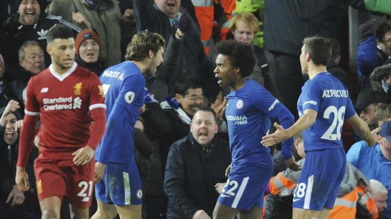 But just as the champions were facing their first defeat in five league games, in-form Willian came off the bench to rescue Chelsea with his 85th minute equaliser. (Photo: AFP)