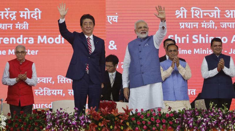 Prime Minister Narendra Modi and his Japanese counterpart Shinzo Abe, who arrived in Ahmedabad on Wednesday on a two-day visit. (Photo: AP)