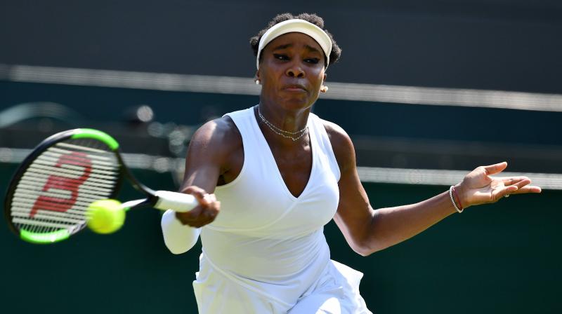 Venus, a five-time champion, had slumped to a 6-2, 6-7 (5/7), 8-6 loss to Kiki Bertens of the Netherlands over on Court One. (Photo: AFP)