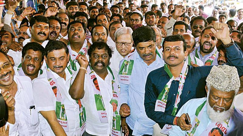 JD(S) workers stage a protest in Bengaluru on Tuesday against former Chief Minister of J&K Omar Abdullahs tweet against party supremo H.D. Deve Gowda.  Mr Abdullah had tweeted after a recent interview of former Pak president Pervez Musharaff to a Pak channel that This is akin to Pakistani channels talking to Deve Gowda to discuss developments in India. Irrelevant no matter how hard hitting.  (Photo: KPN)