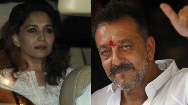 Madhuri Dixit and Sanjay Dutt.